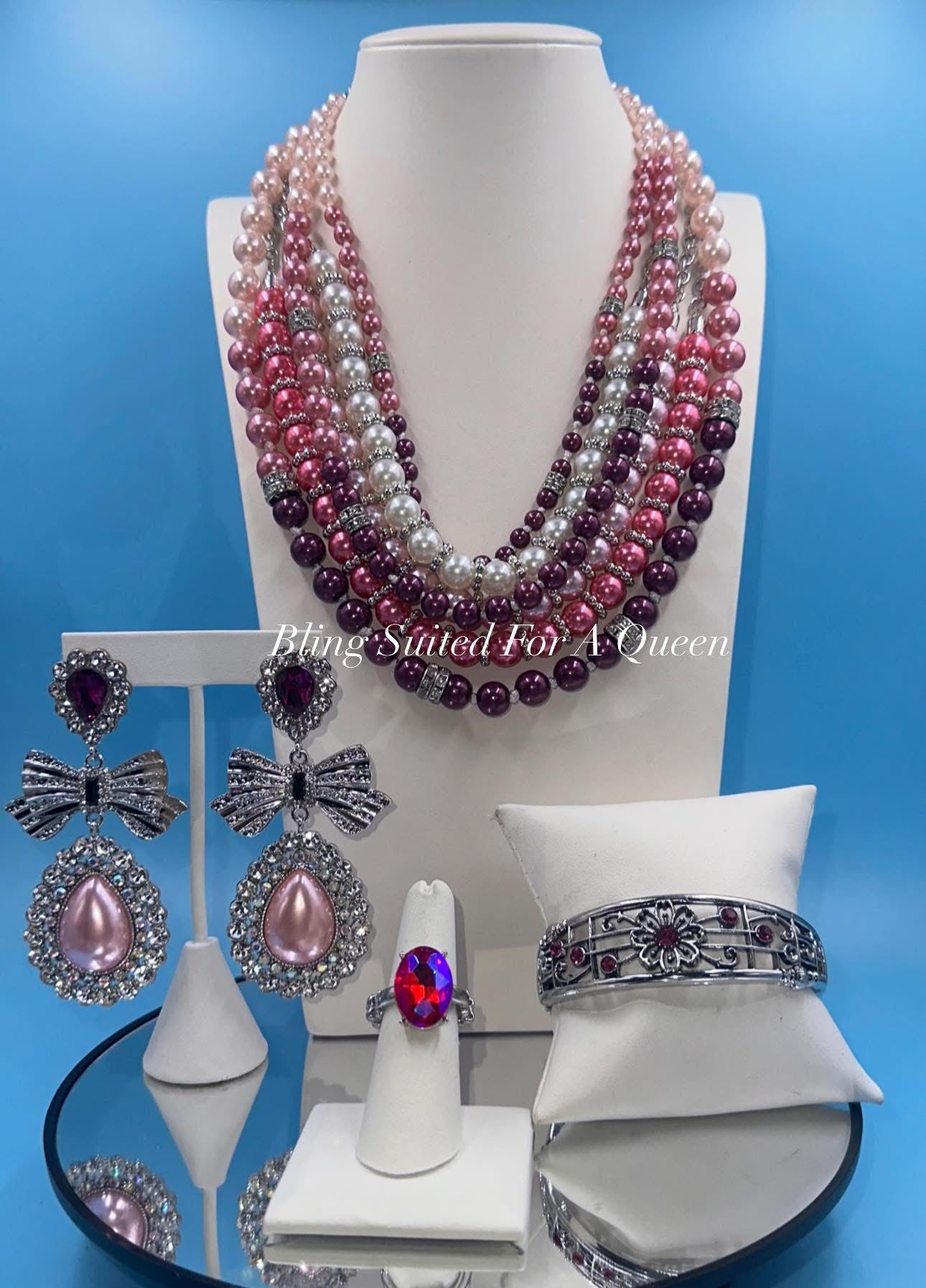 Set it up with Lola -pink/purple pearls
