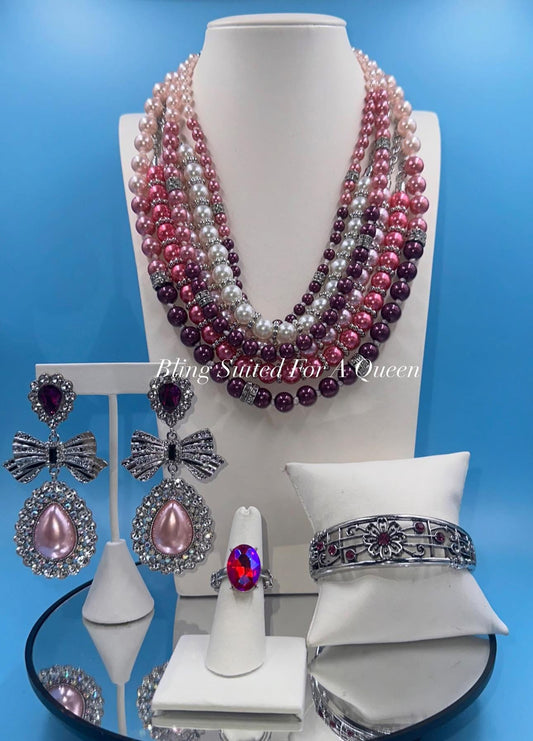 Set it up with Lola -pink/purple pearls