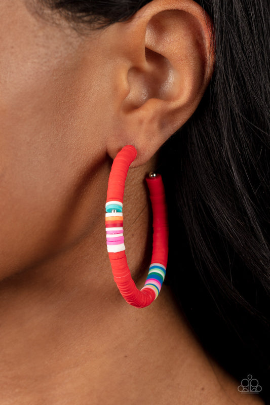 Pendientes rojos de colores contagiosos