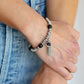 Whimsically Wanderlust - Pulsera negra
