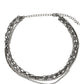 Collar negro con purpurina y chismes