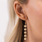 Reeling in Radiance - Gold necklace